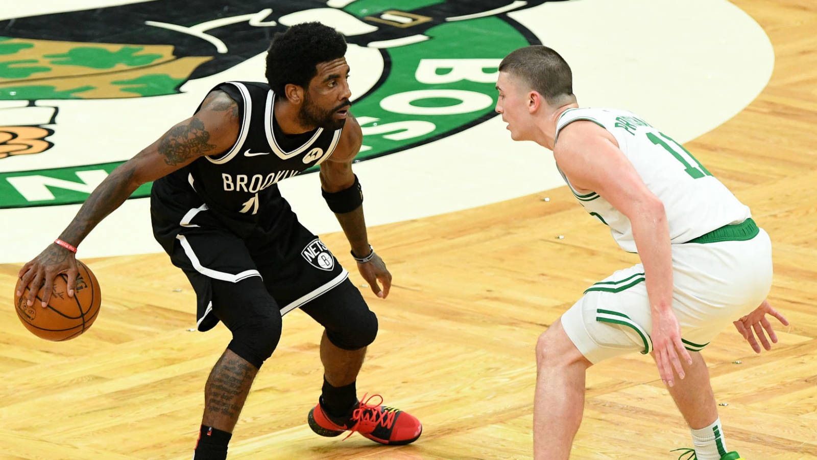 Celtics fan who threw water bottle at Kyrie Irving charged with assault and battery by means of a dangerous weapon