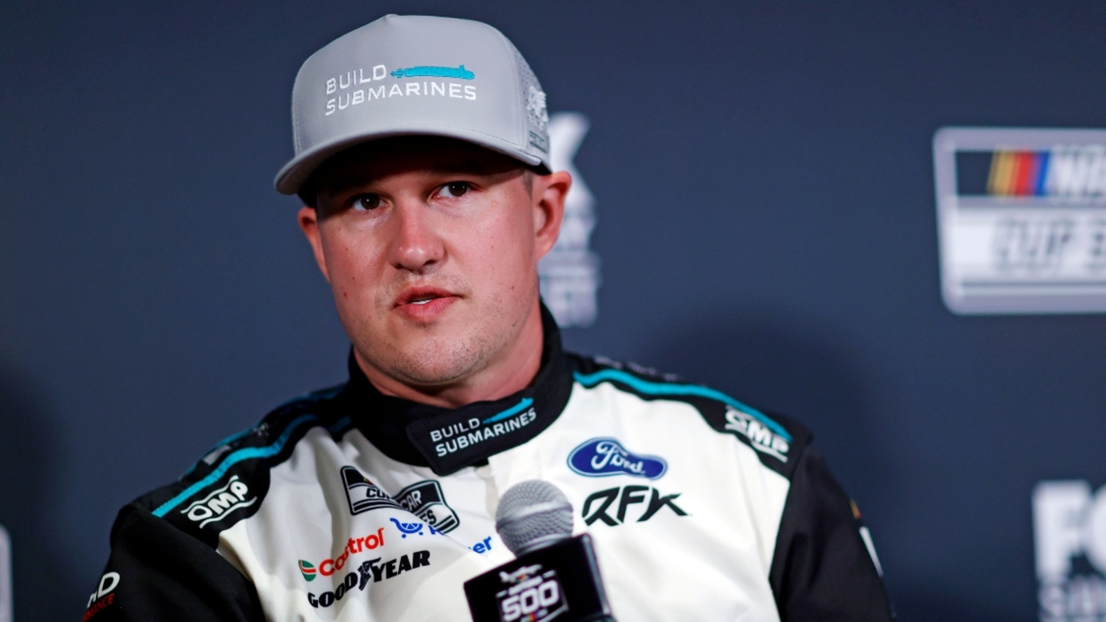 http://www.yardbarker.com/media/2/4/24a52da85a66f6d72a11b6e6954d88ccbc90daec/thumb_16x9/freddie-kraft-clowns-ryan-preece-after-choose-cone-drama-at-nascar-all-star-open-race.jpg