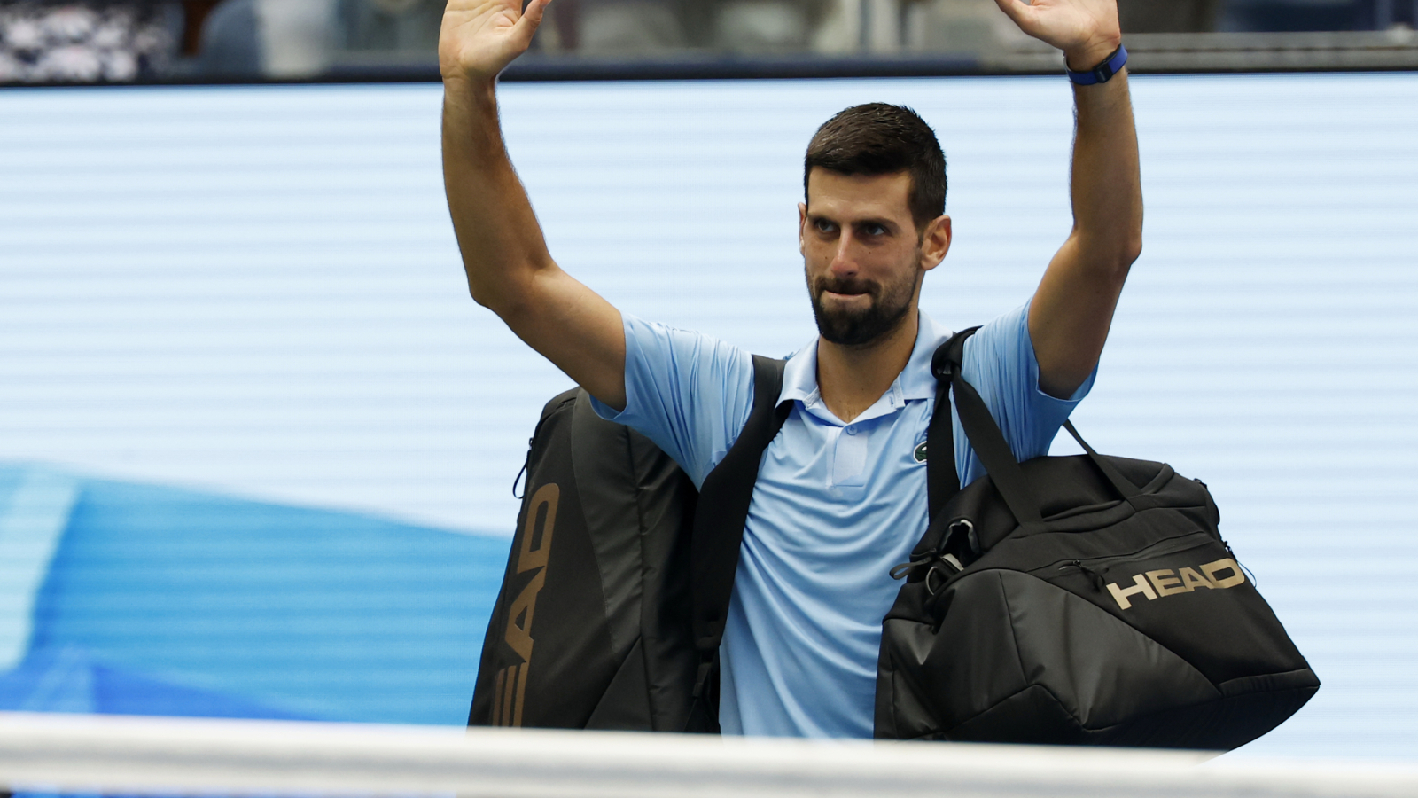 Novak Djokovic overcomes humidity and injury to advance into Shanghai Masters quarter-finals