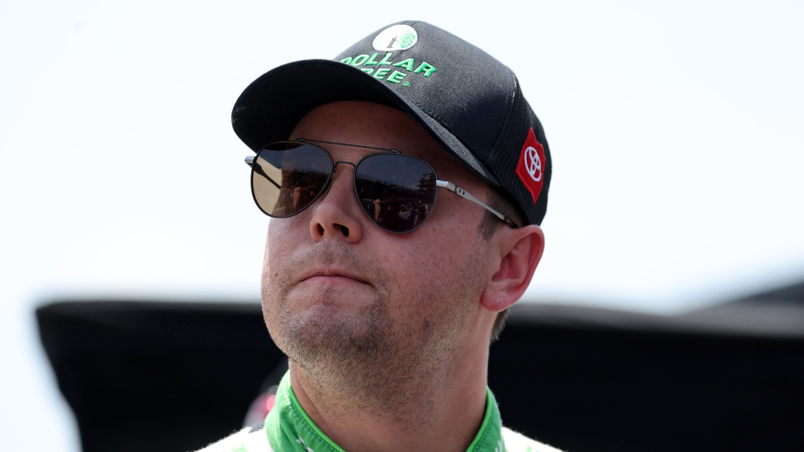 Erik Jones completes pit stop sideways in stall after getting hit by C