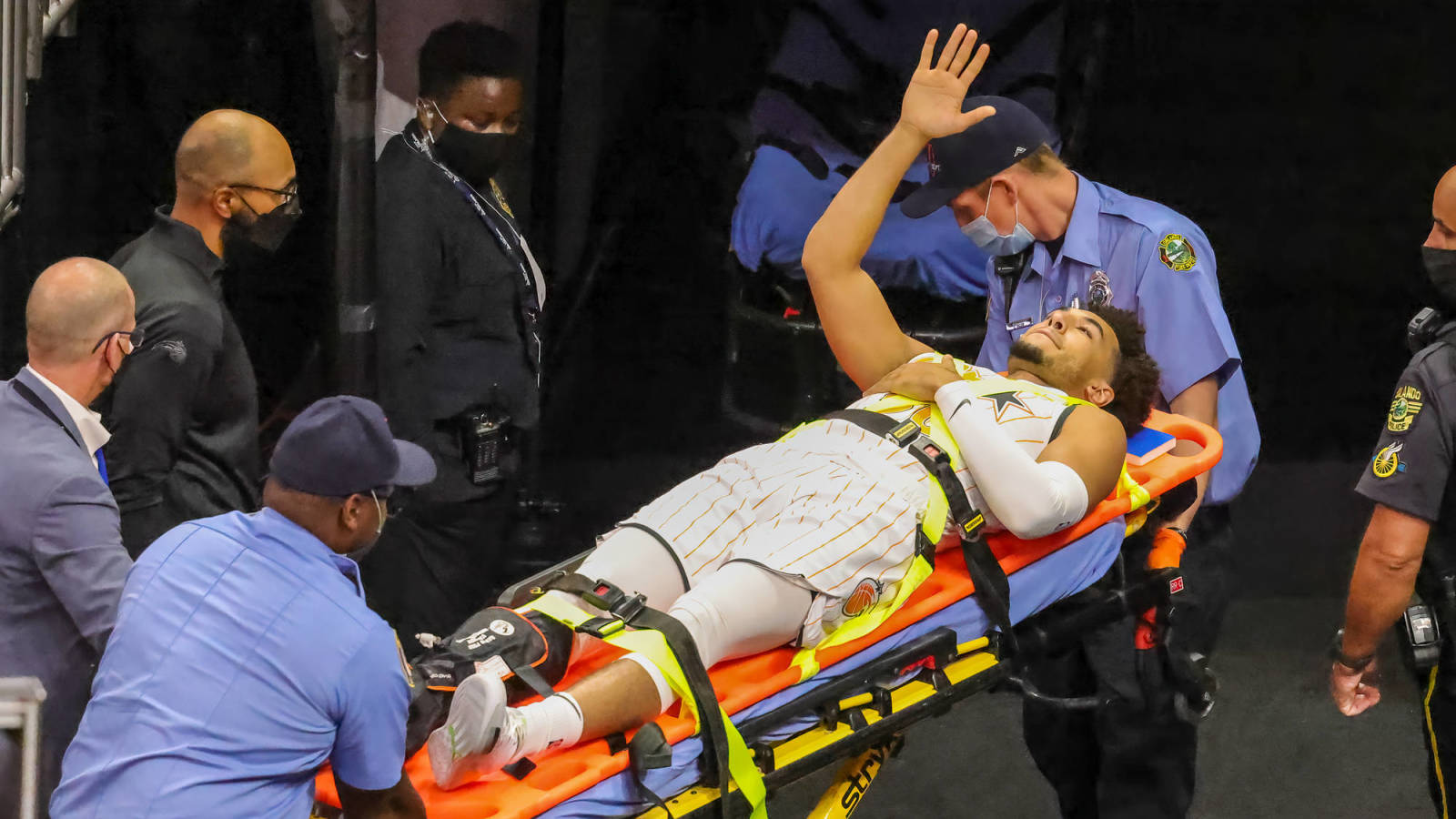 Magic rookie Devin Cannady stretchered off after scary leg injury