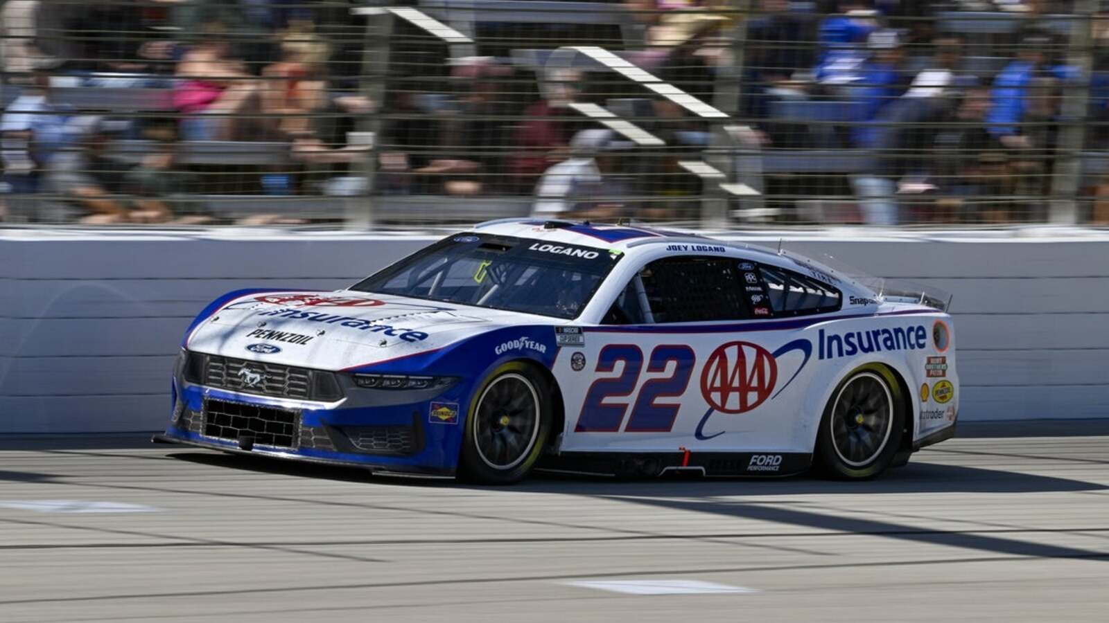 Joey Logano shines to win Wurth 400 title