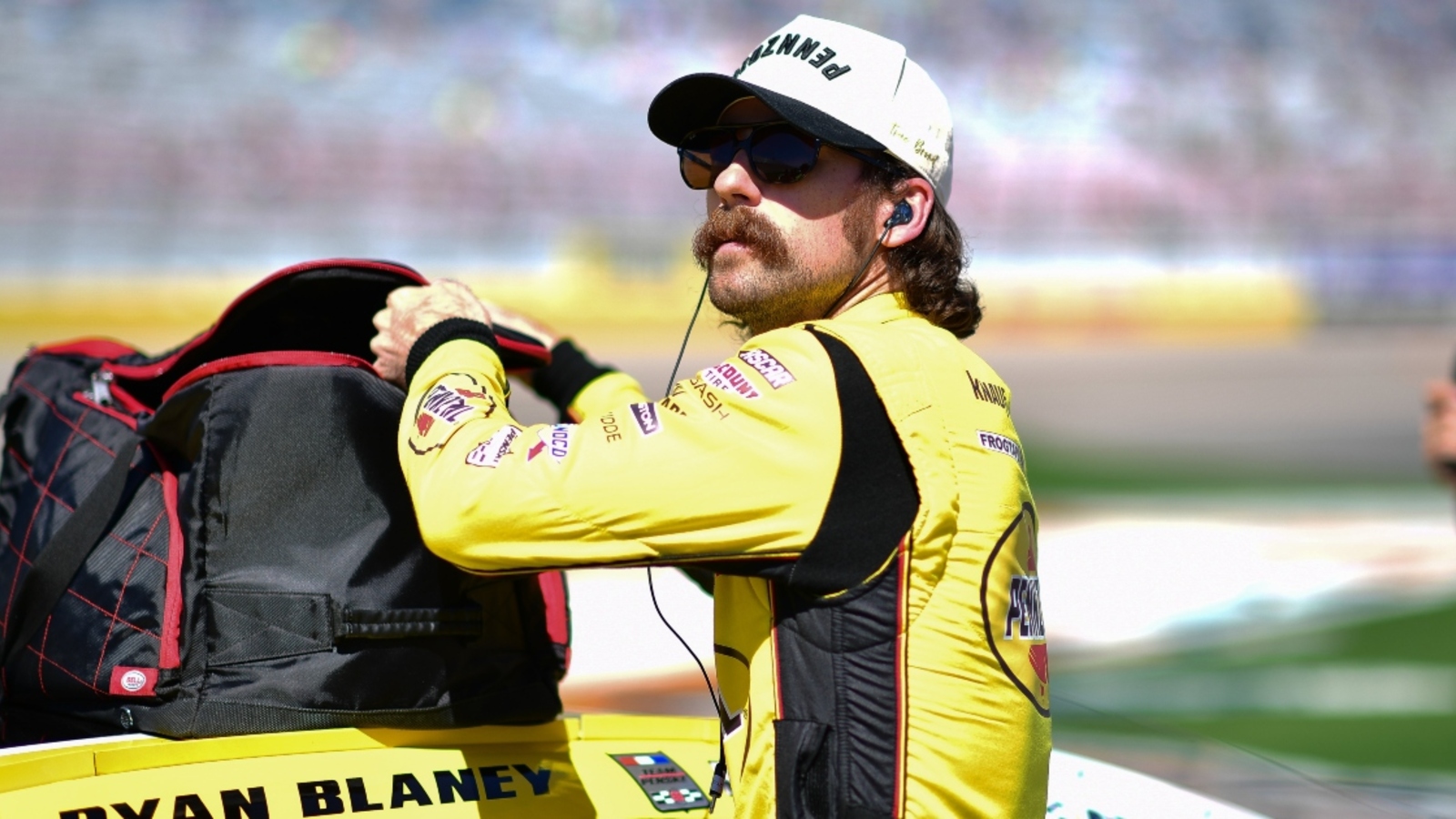 Kevin Harvick reacts to Ryan Blaney pit road incident at Kansas, believes he’s ‘overachieving’ for Penske