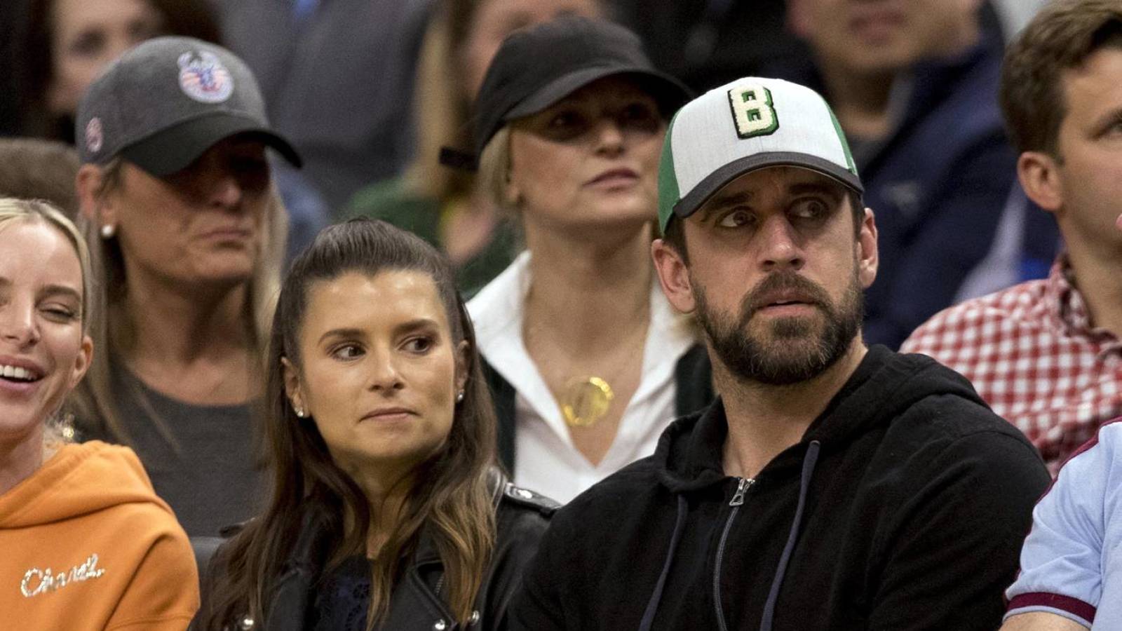 Danica Patrick was helping Aaron Rodgers mend his family relationships?