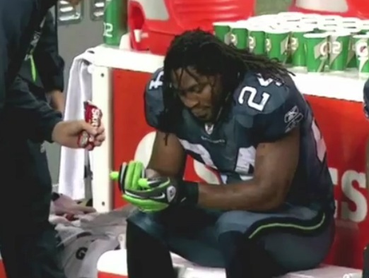 Marshawn Lynch snags free supply of Skittles after post-TD snacking