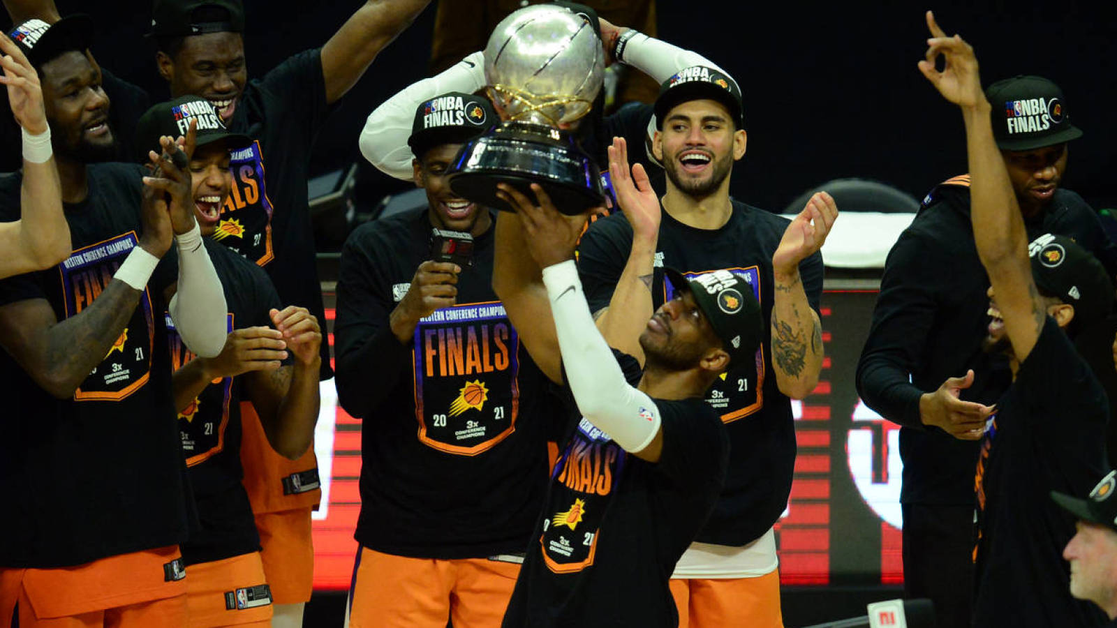 Chris Paul, Billy Crystal hug after Suns win Game 6 to advance to NBA Finals