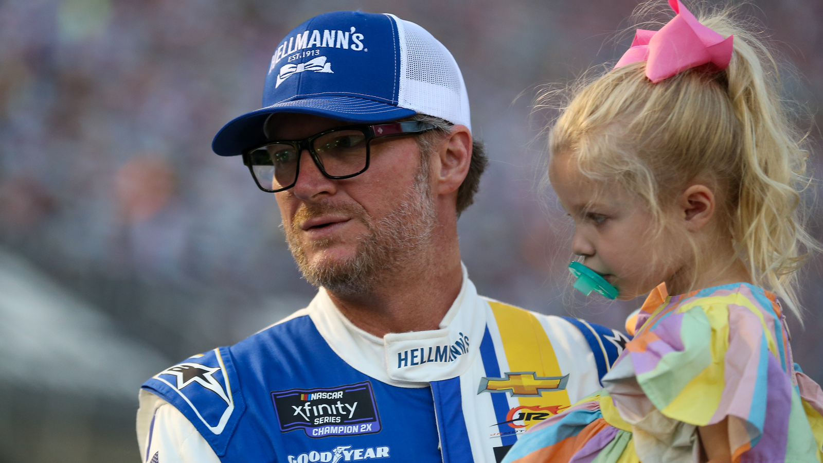 Dale Earnhardt Jr. reacts to Bayley Currey losing roof during Truck race at Atlanta