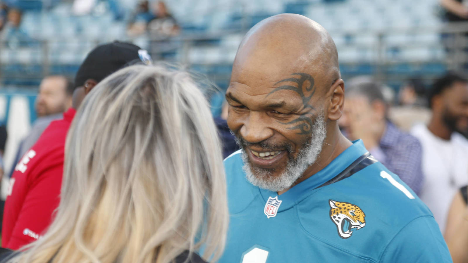 Mike Tyson attends Jaguars game in teal 