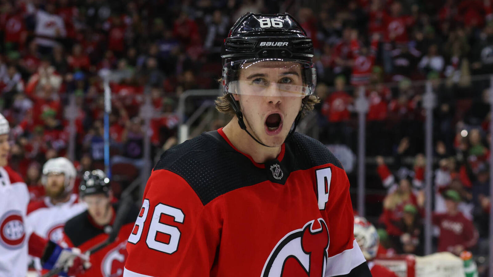 New Jersey Devils center Nico Hischier (13) skates during warmups