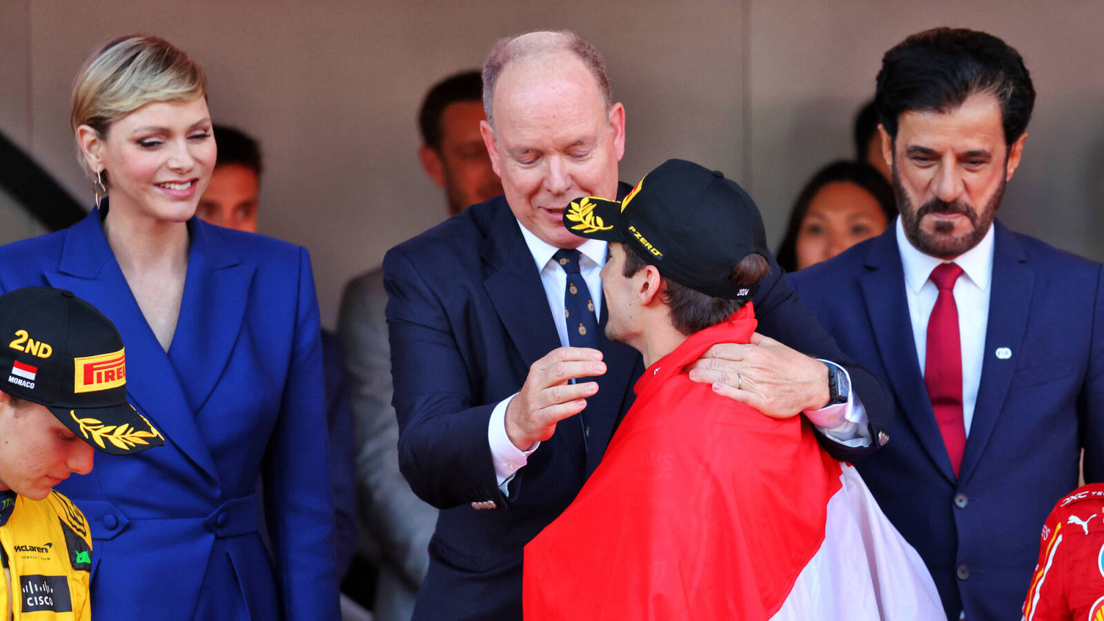 Watch: Prince of Monaco Albert II hugs Charles Leclerc on the Monaco GP podium after the Ferrari star’s emotional victory