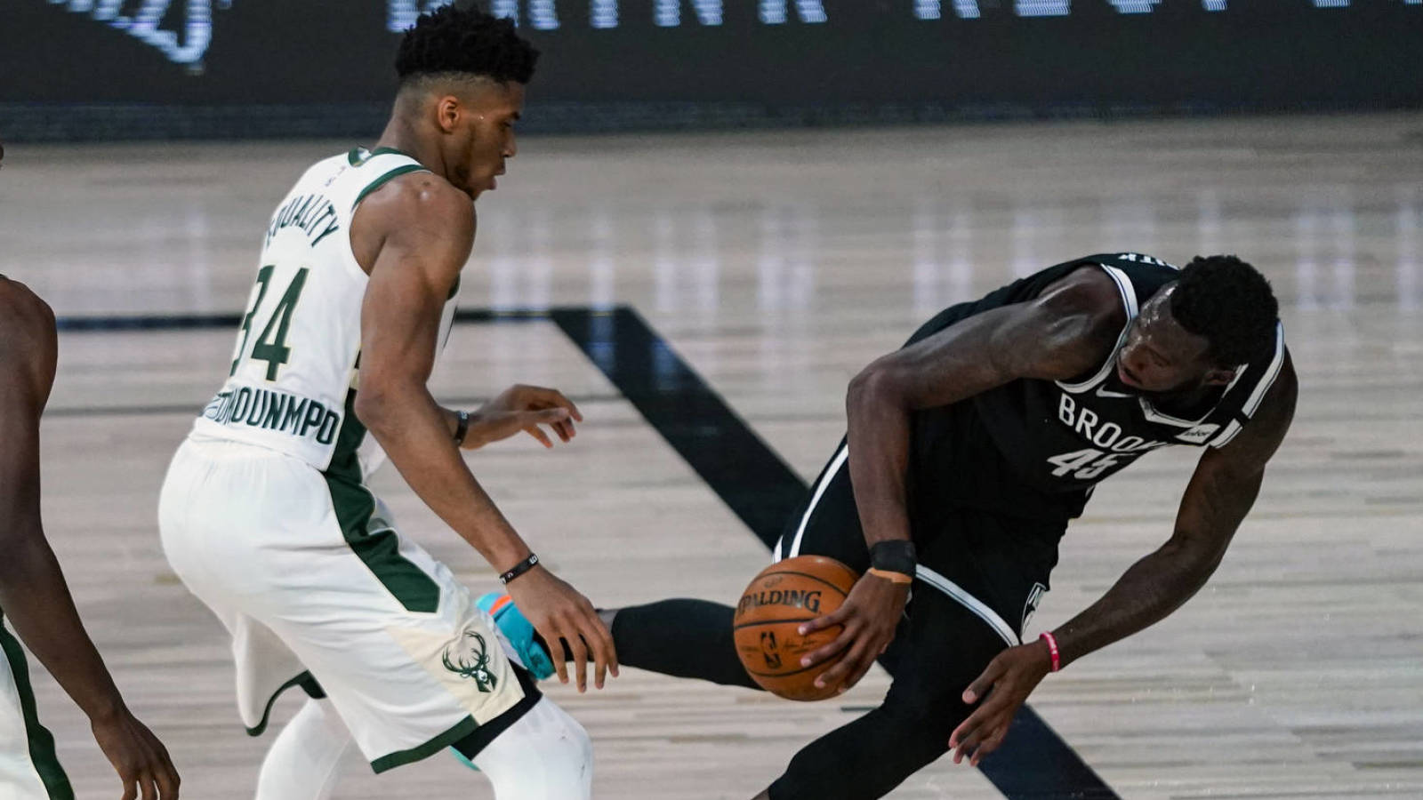 Watch Giannis Antetokounmpo Restrained From Going After Nets Donta Hall Yardbarker