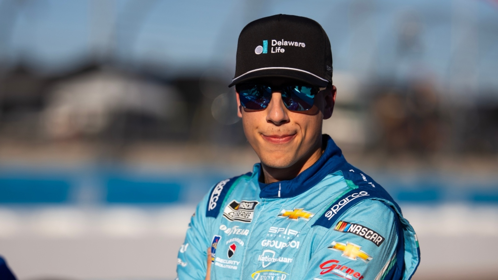 http://www.yardbarker.com/media/b/b/bbab97f1e5a22dd9d7e03f10c0cb9cc1ddc4f69a/thumb_16x9/denny-hamlin-calls-out-carson-hocevar-for-flipping-off-layne-riggs-during-trucks-win-at-kansas.jpg