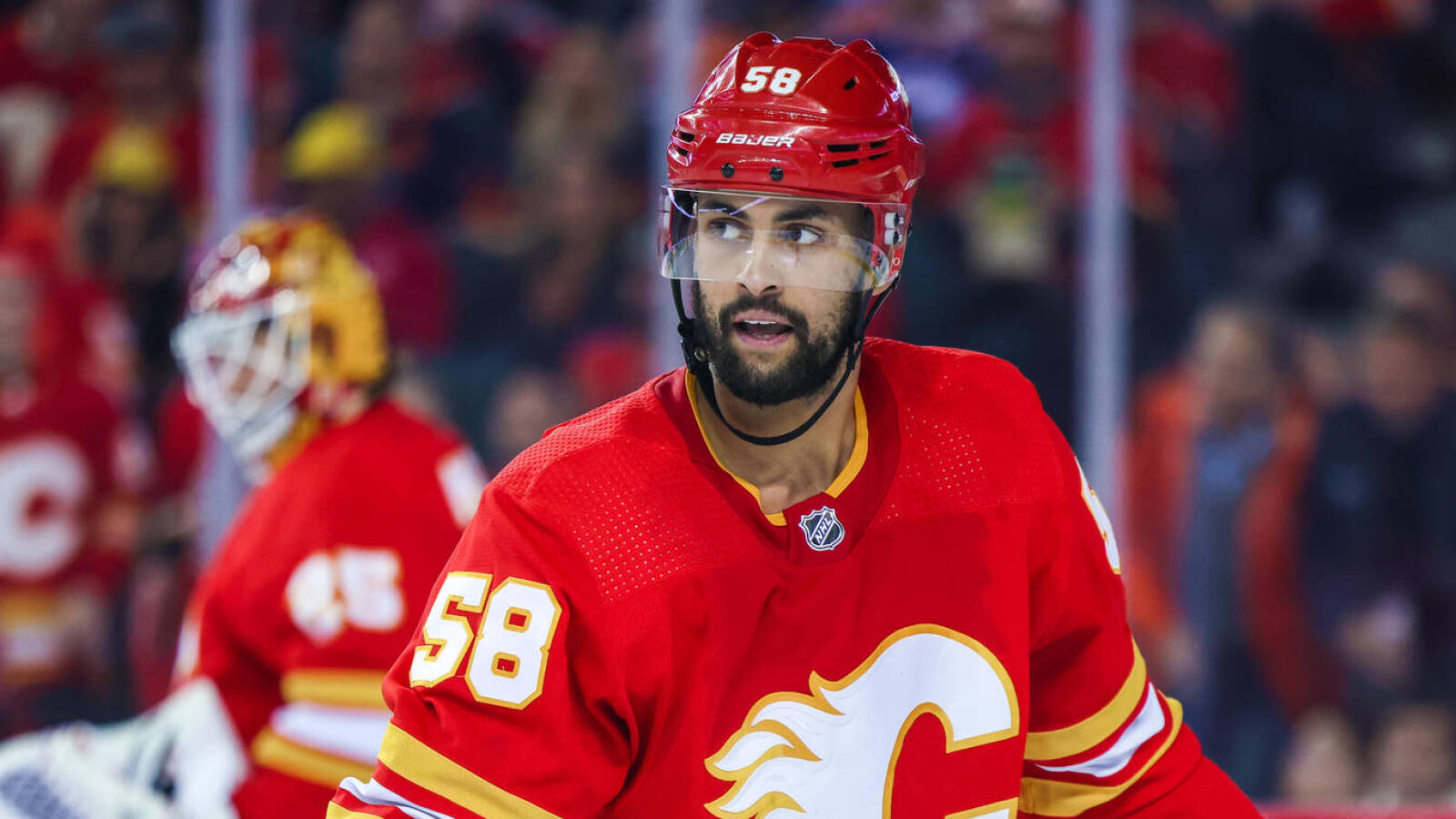 Flames defenseman to miss start of training camp