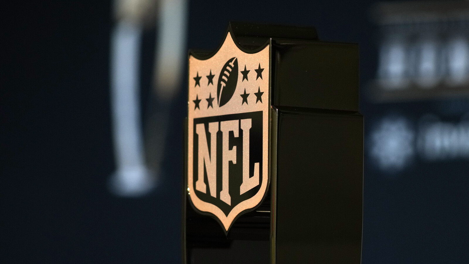 Suspect dies in NFL headquarters building after shooting