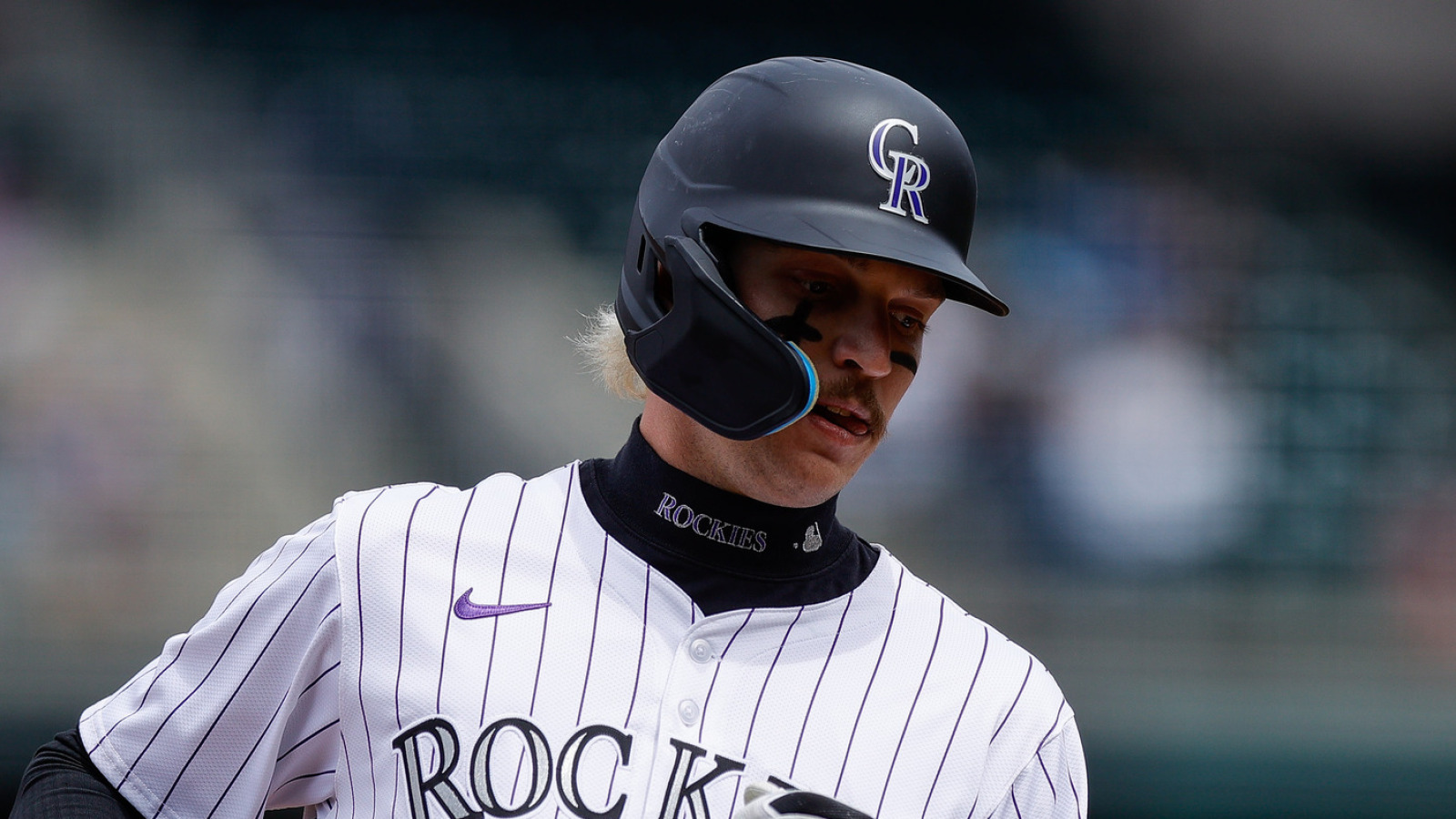 Rockies send down top prospect, raising questions about player development
