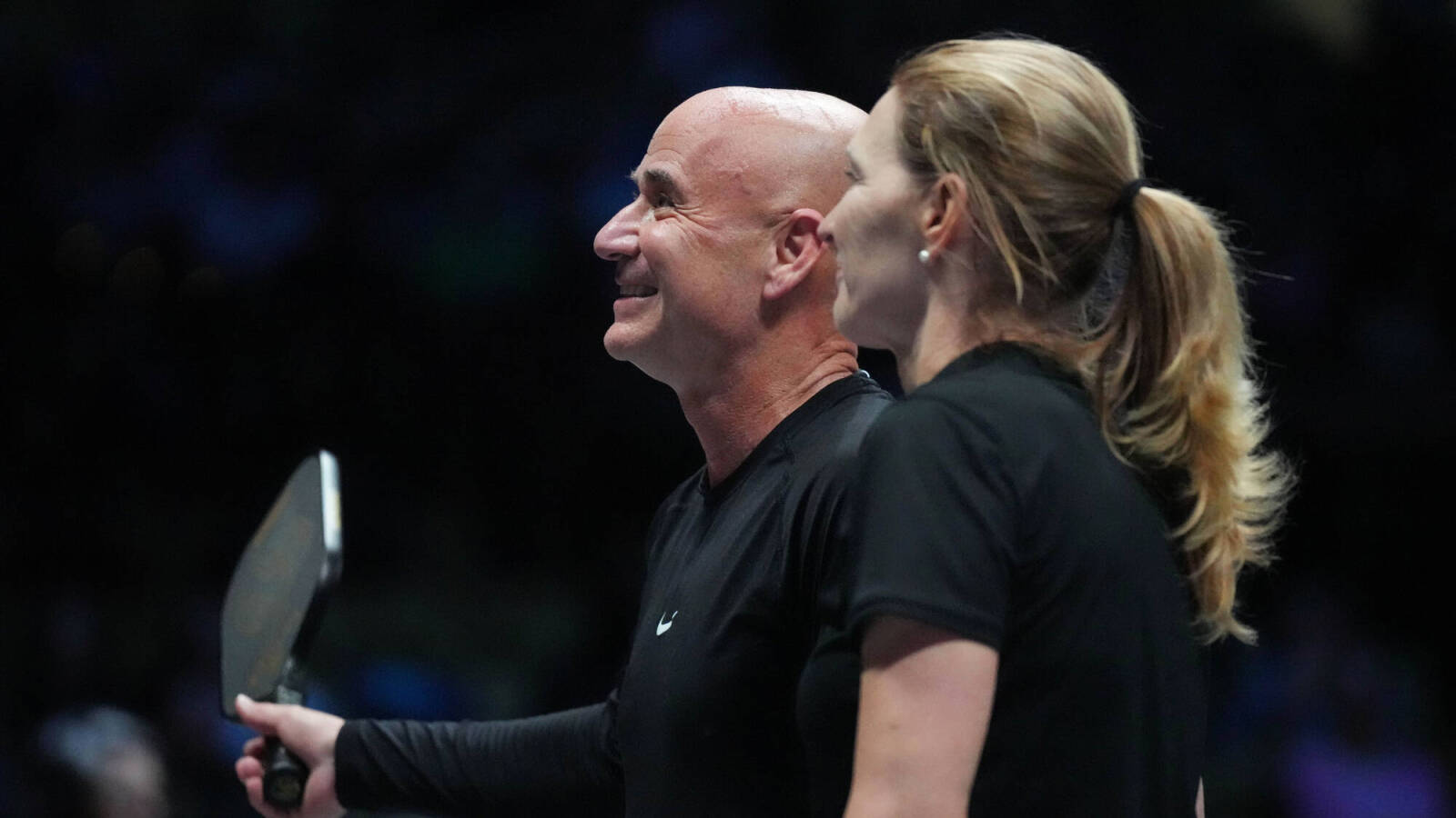 Andre Agassi couldn’t stop smiling as he poses with wife Stefi Graf after winning Pickleball Slam 2