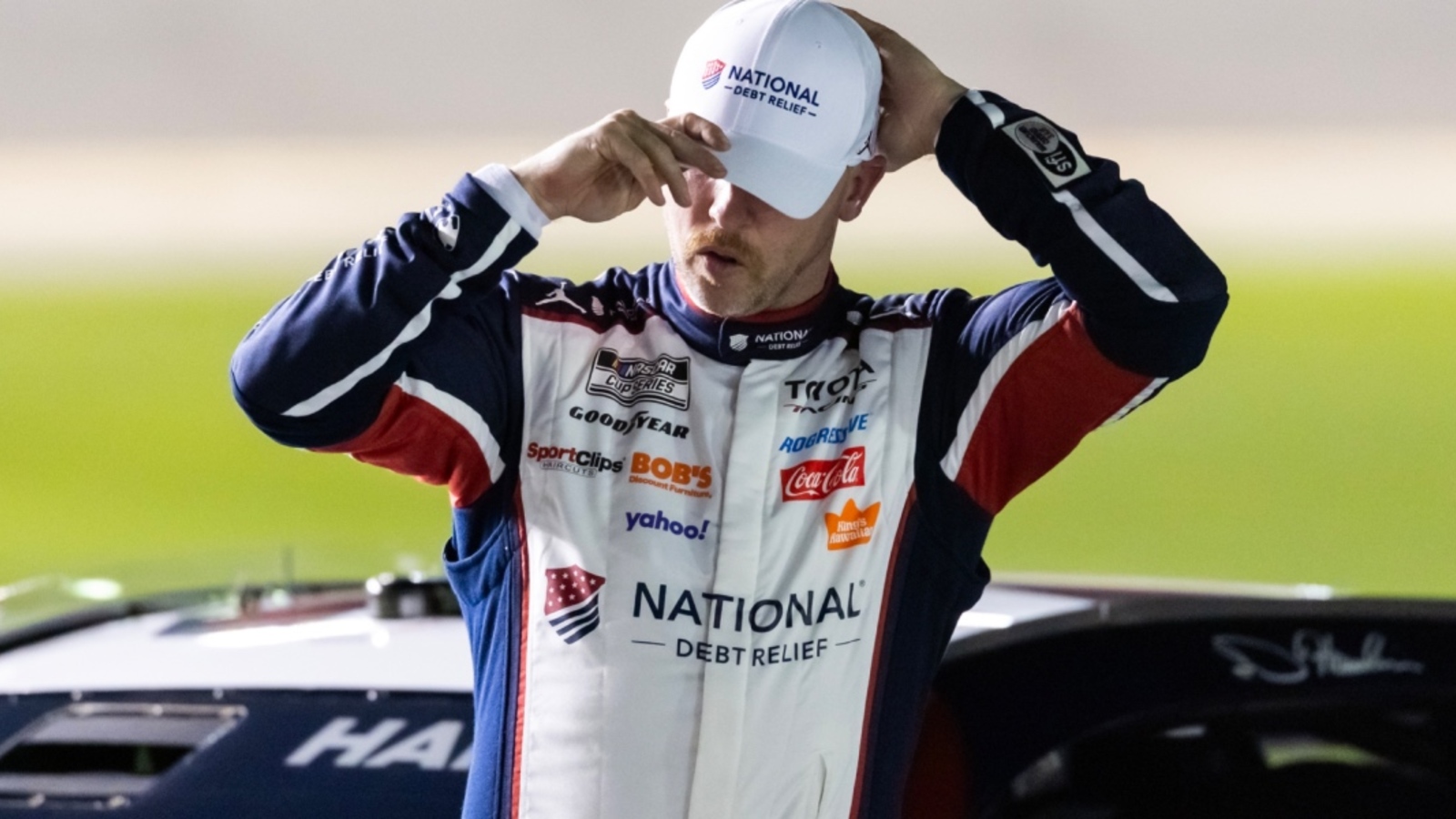 Denny Hamlin reacts to wreck after contact with Joey Logano at Atlanta, assigns blame