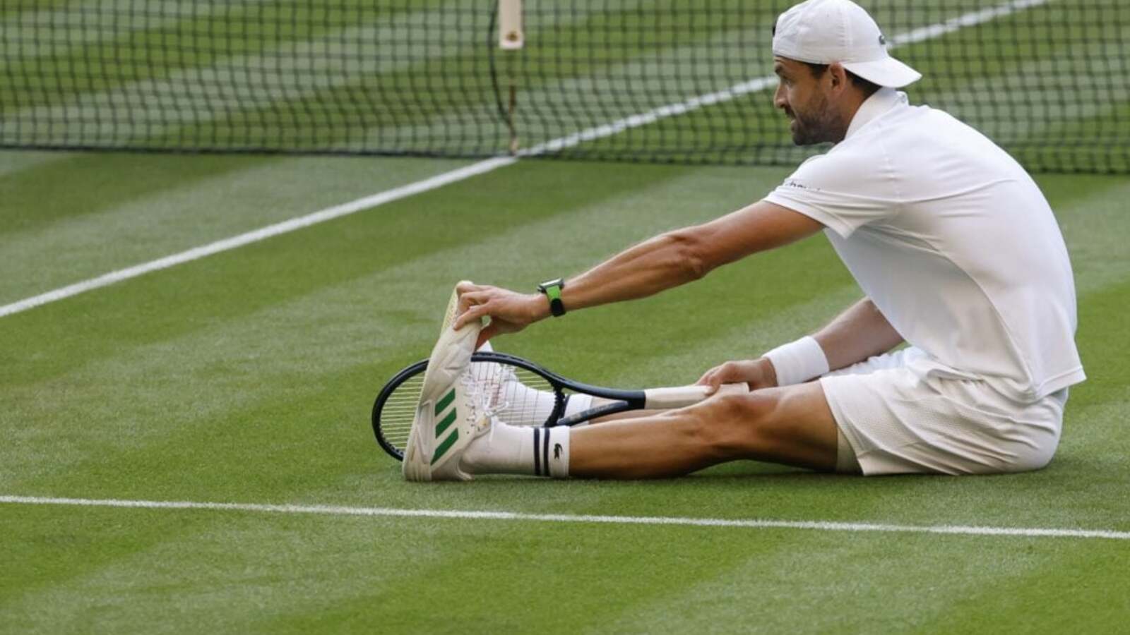 Grigor Dimitrov defined again in defeat