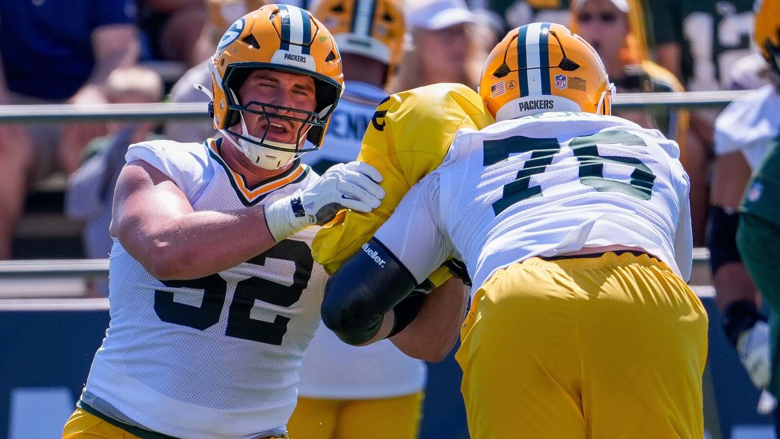 Packers training camp opens with encouraging signs for young players, but one development tempers the excitement