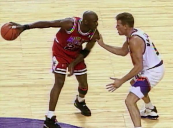 NO FILM, NO VIDEO, NO TV, NO DOCUMENTARY - Chicago Bulls Michael Jordan  celebrates a last-second game winning shot with teammates Scottie Pippen,  right, Jud Buechler, left-rear, and Dennis Rodman, rear. Chicago
