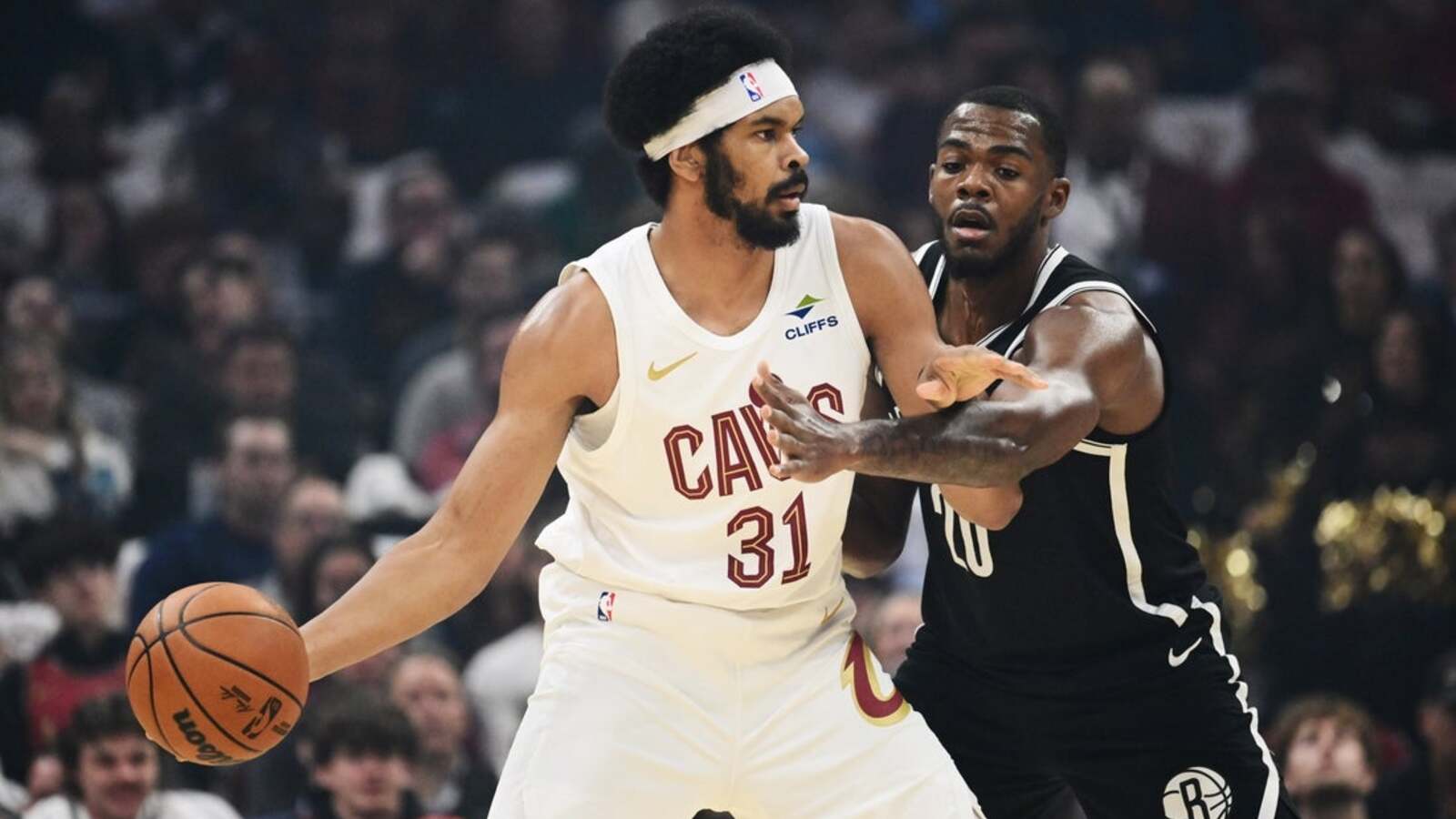 Cavaliers hold off Nets for first win of season