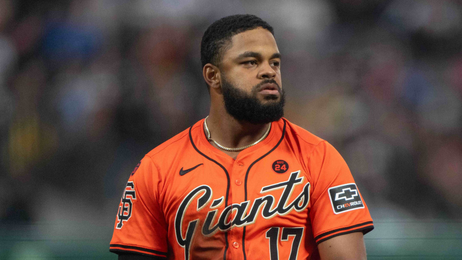 Breakout Giants outfielder sits in opposition to Reds with harm