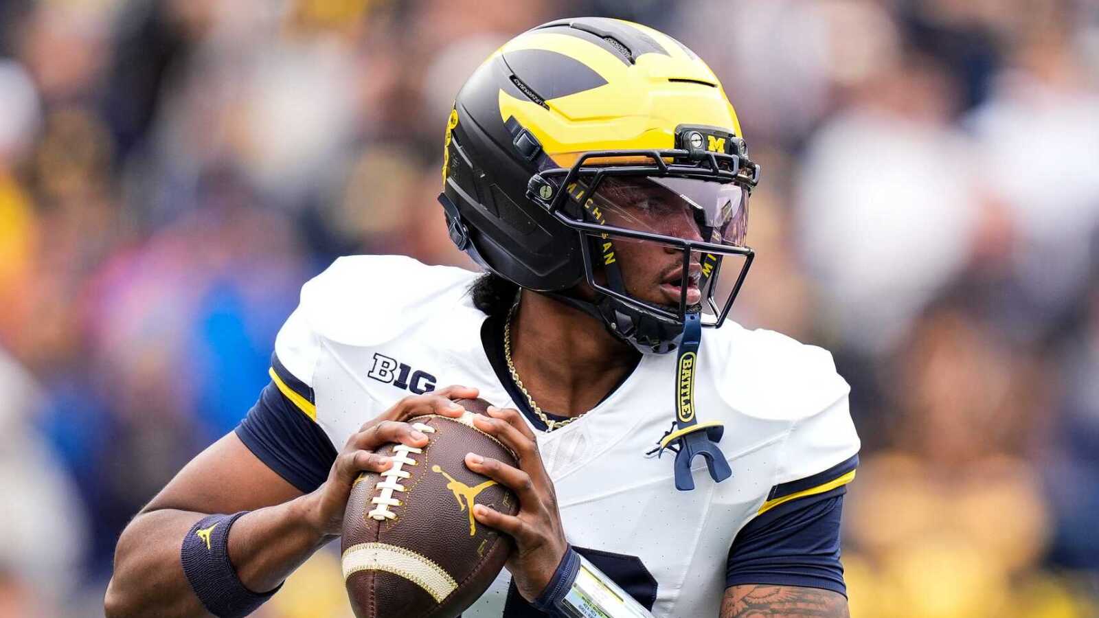 Michigan HC Kyle Whittingham putting some pressure on QB Bryce Underwood