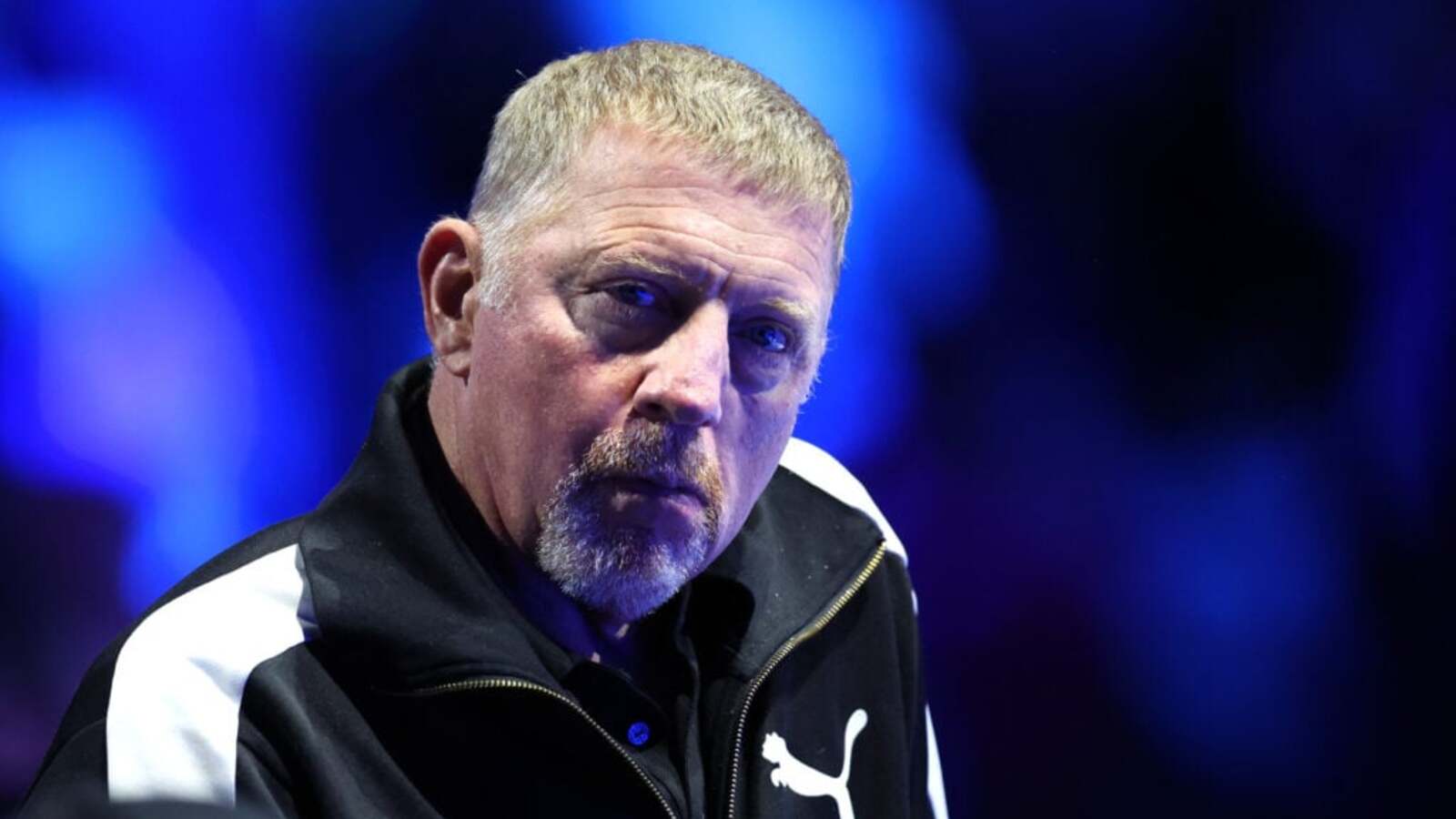 Boris Becker reacts after Carlos Alcaraz breaks one of his records in the Doha final