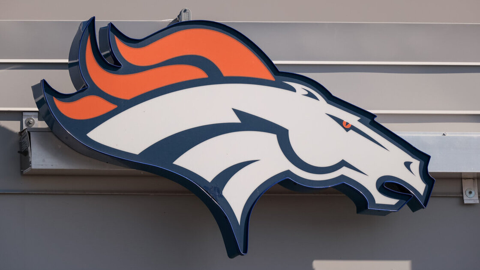 Colorado high school football team shows helmet donated by the Denver ...