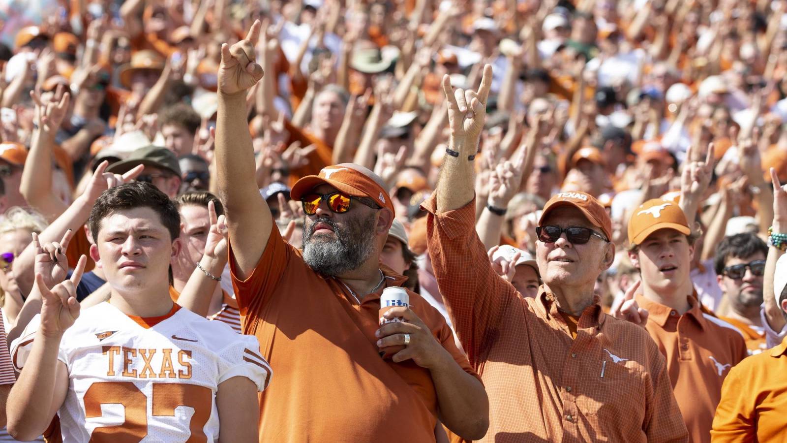 Watch Texas fans throw beer cans onto field during Big 12 Championship