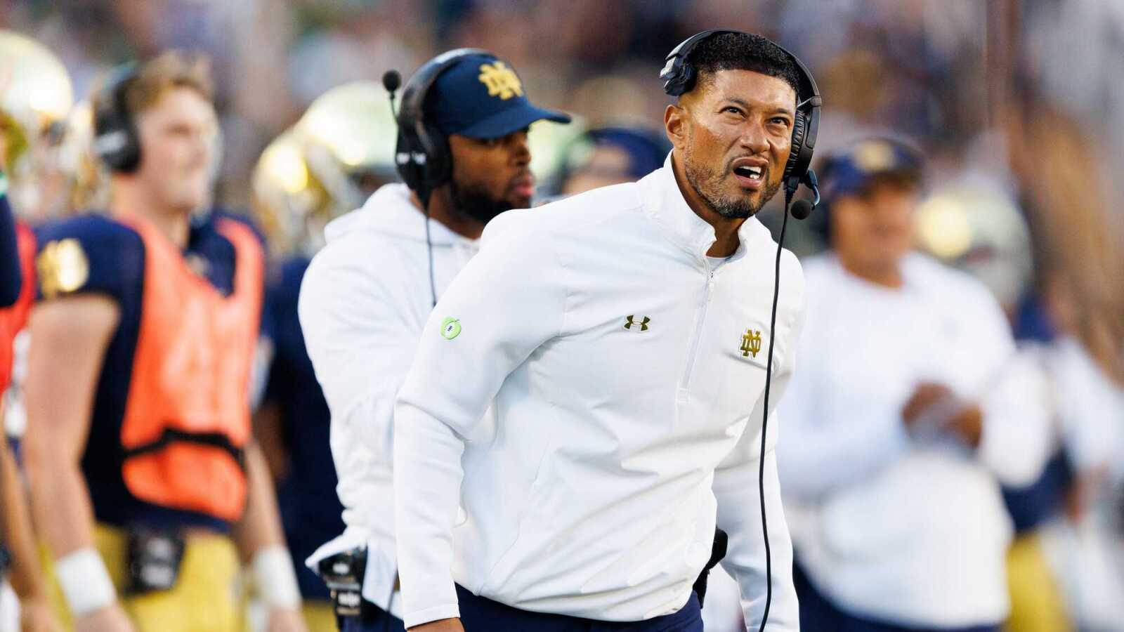 https://www.yardbarker.com/media/2/9/292acfc846922970fca7d4efd685665f3dbfd073/thumb_16x9/notre-dame-head-coach-marcus-freeman-looks-on.jpg?v=1
