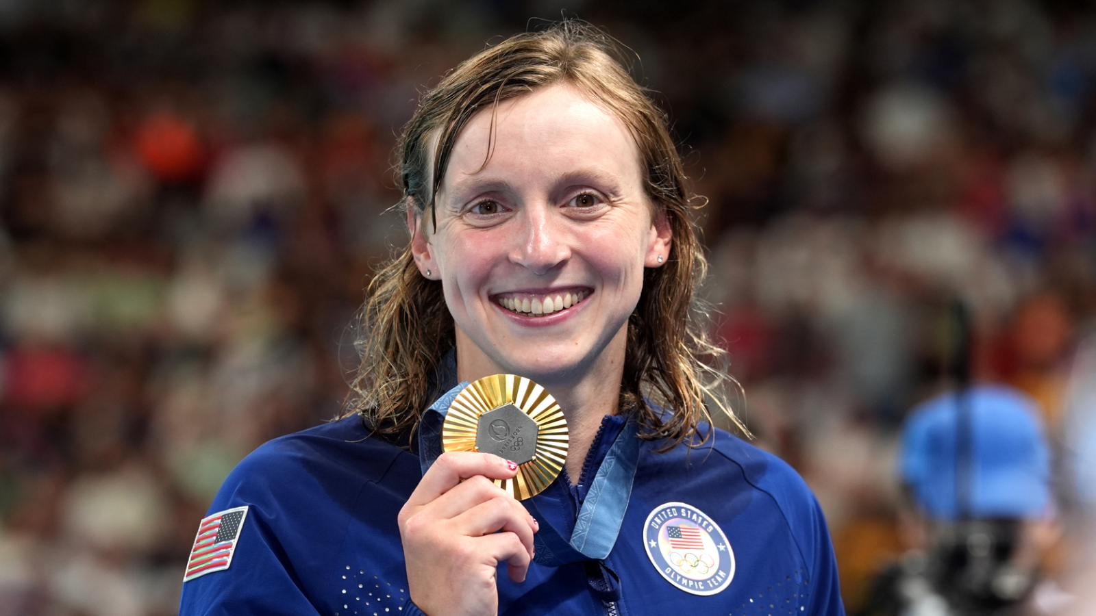 Katie Ledecky ties Olympic record with 12th swimming medal