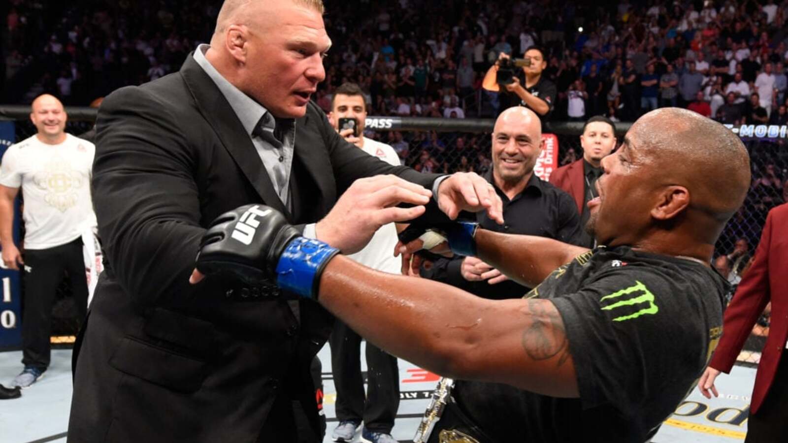 Daniel Cormier pleads with former UFC rival Brock Lesnar in reaction to WrestleMania retirement