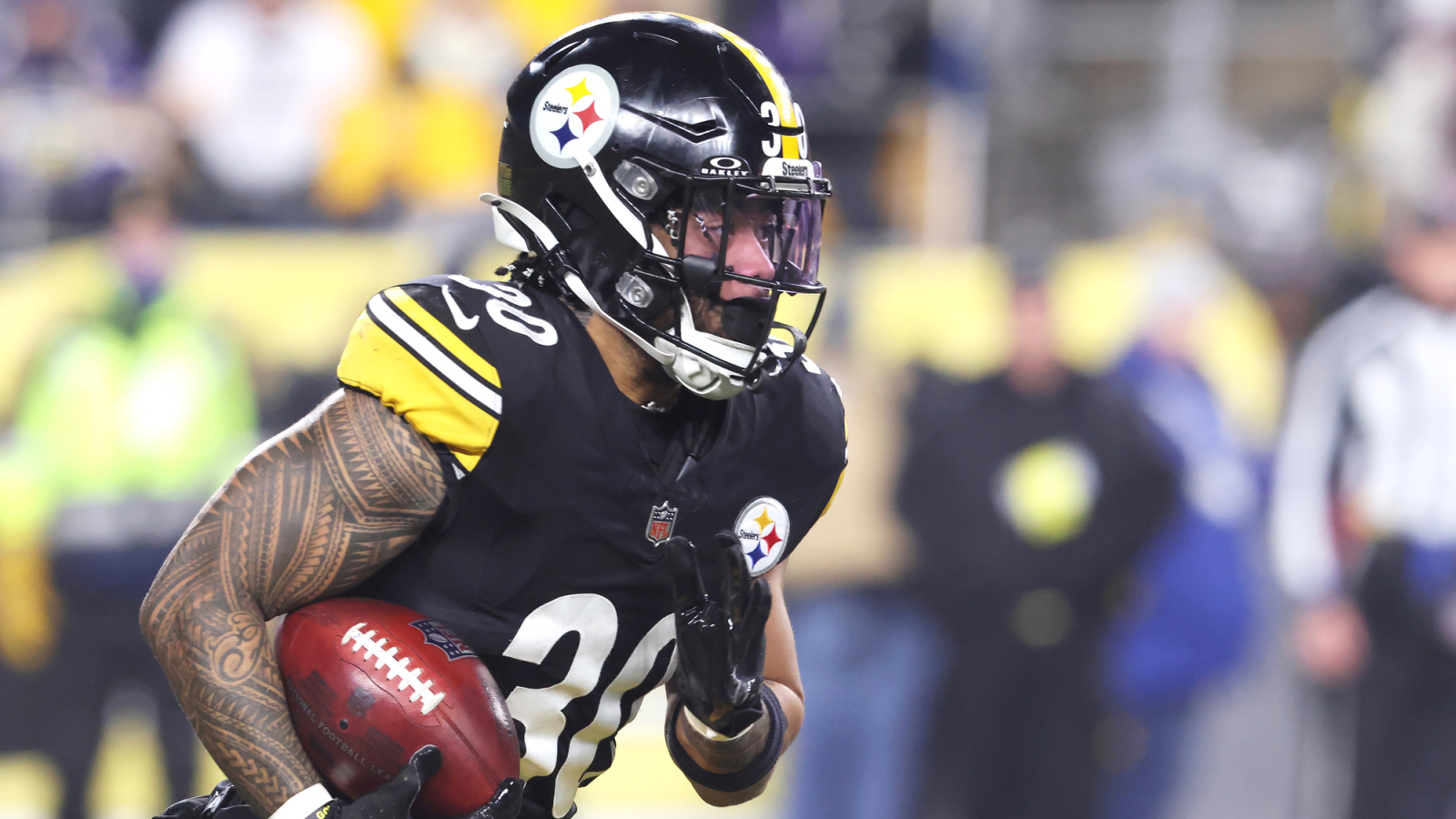 Archival January 2026 action photo of Jaylen Warren running for Pittsburgh