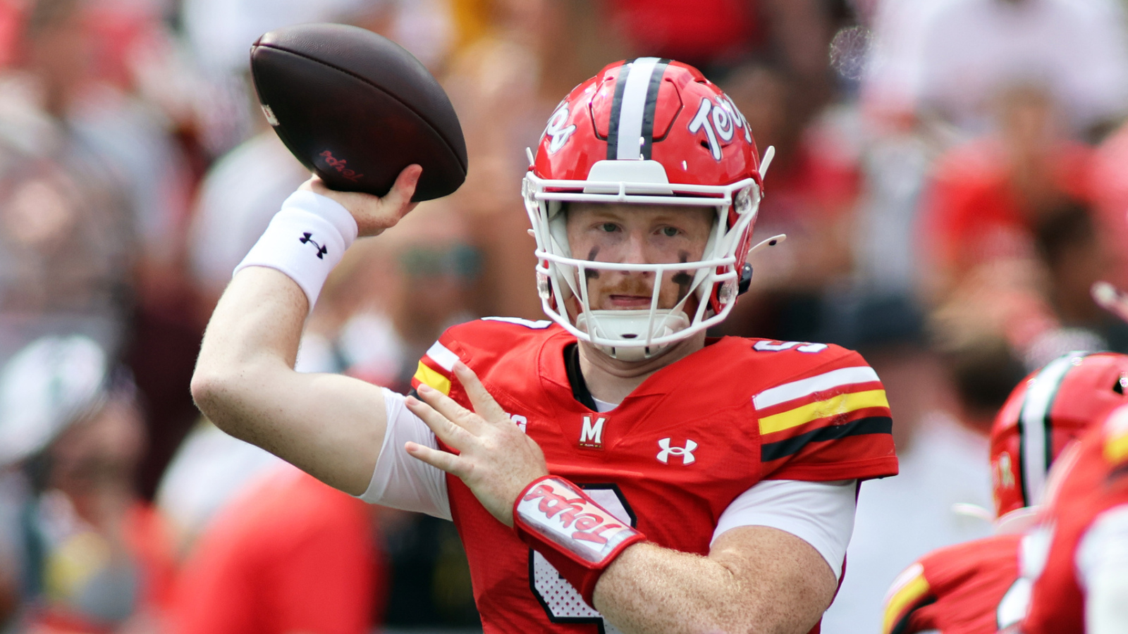 wisconsin-lands-two-starting-qbs-via-tra