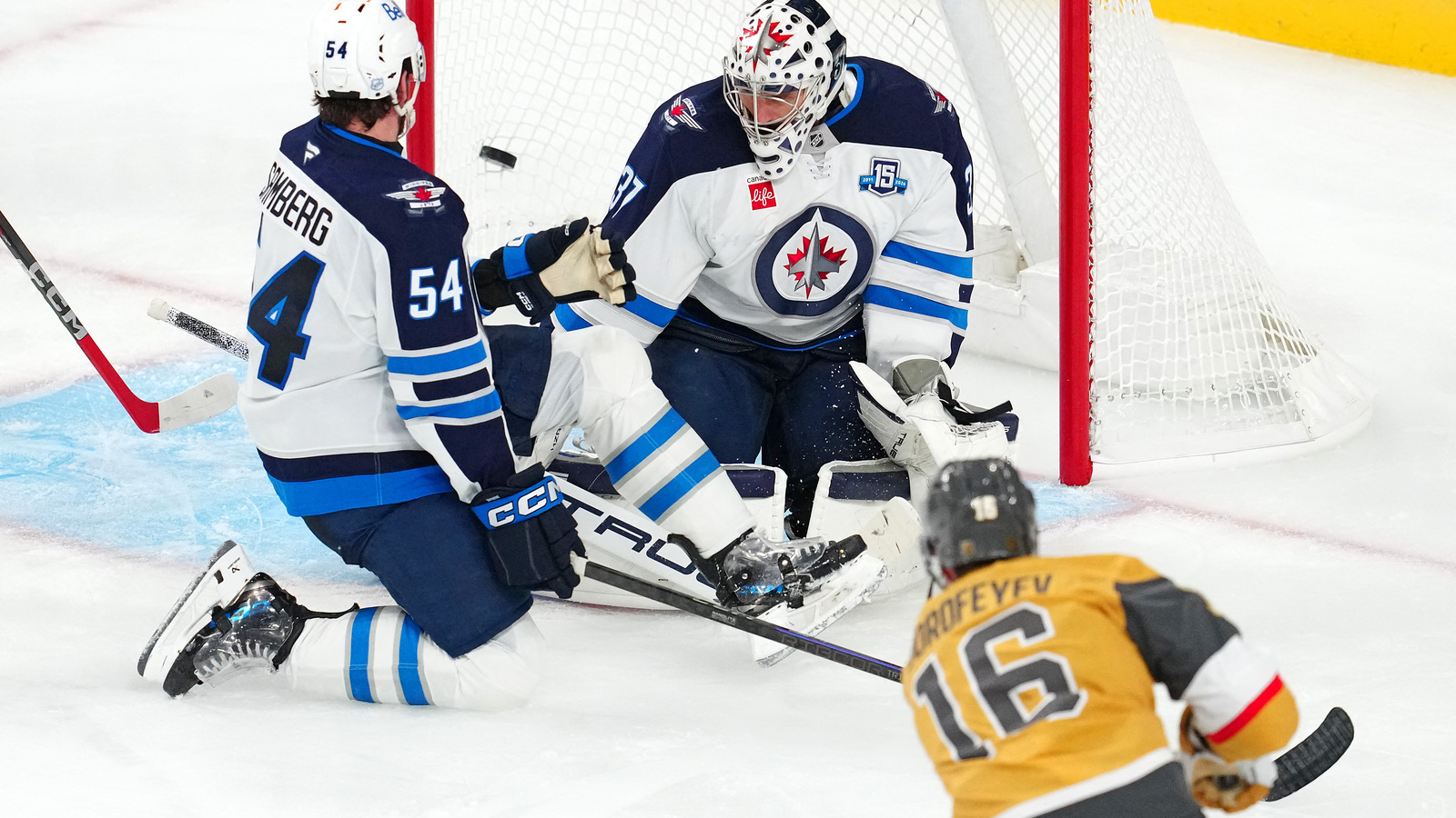 Connor Hellebuyck Wasting No Time, Making Debut for the Devils