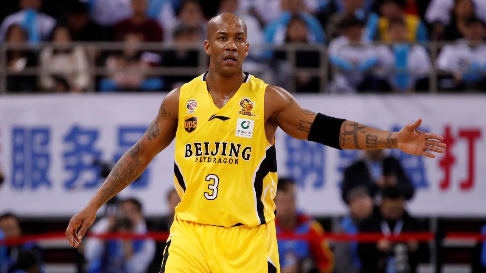 New Jersey Nets' and Eastern Conference All Star Stephon Marbury, right,  makes what was to be the winning shot against Phoenix Suns and Western  Conference All Star Jason Kidd, left, as the