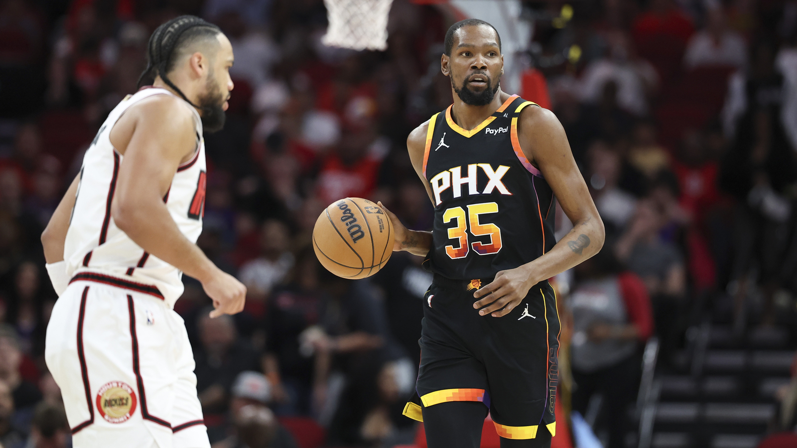 Kevin Durant brings the ball up the court against Rockets at Toyota Center