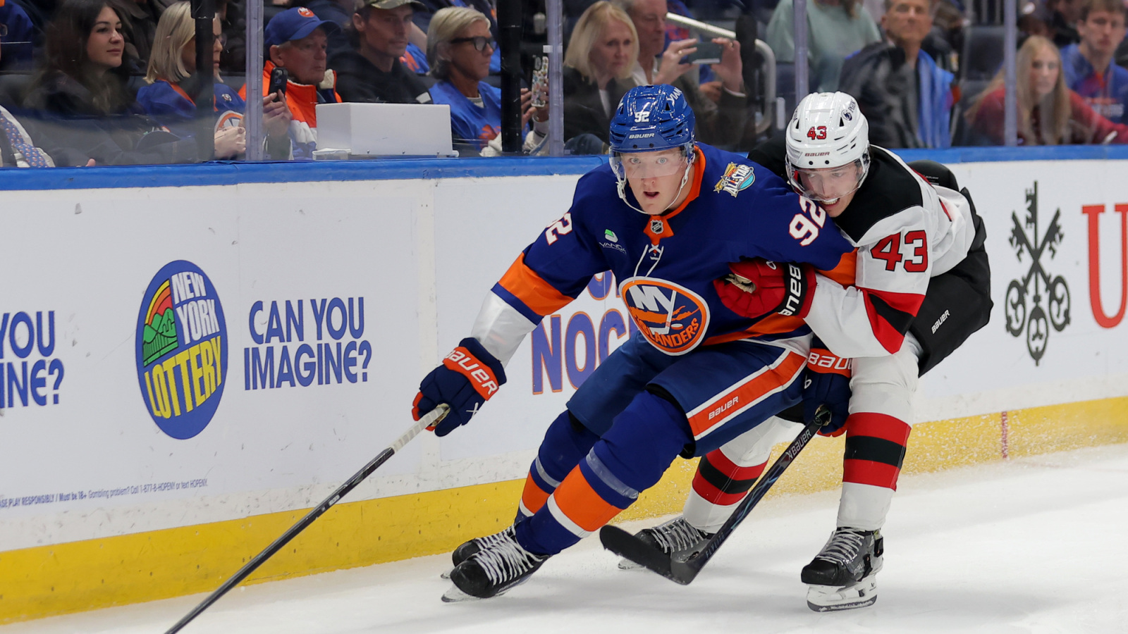 Islanders’ Simon Holmstrom, Alexander Romanov Leave With Injury
