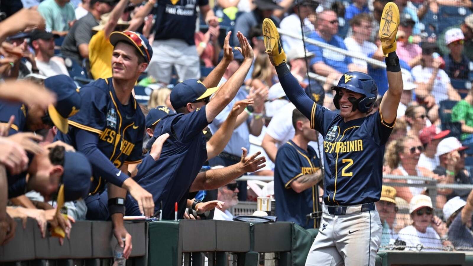 No. 16 West Virginia pounds Troy 12-0 in elimination game
