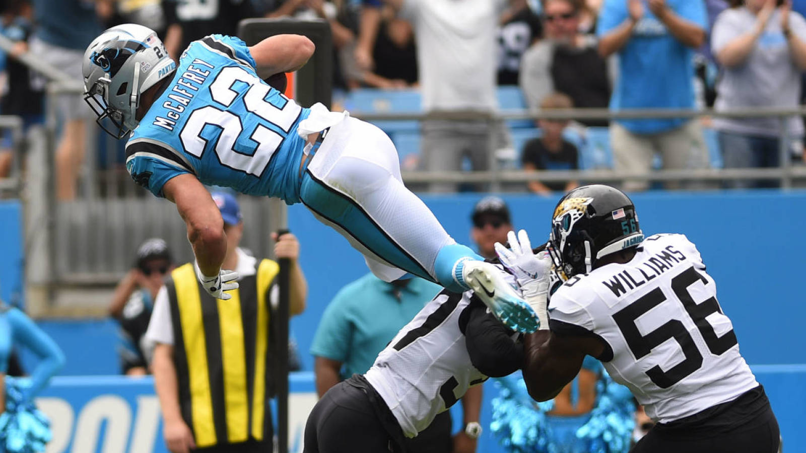 Watch Christian McCaffrey takes flying leap over defender, flips into