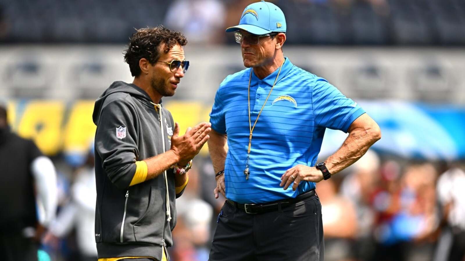 Jim Harbaugh sticking with Mike McDaniel as Chargers’ play-caller