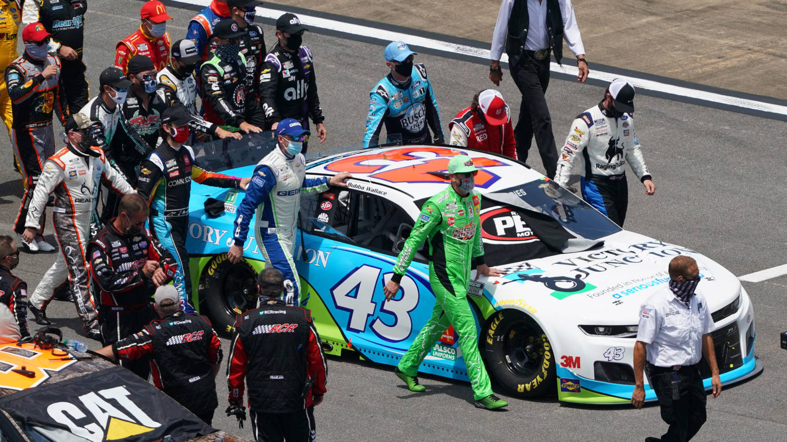 NASCAR drivers push Bubba Wallace’s car down pit road in emotional show