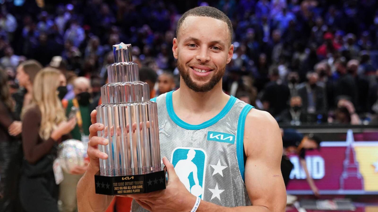 Stephen Curry wins All-Star MVP with record-setting shooting display.
