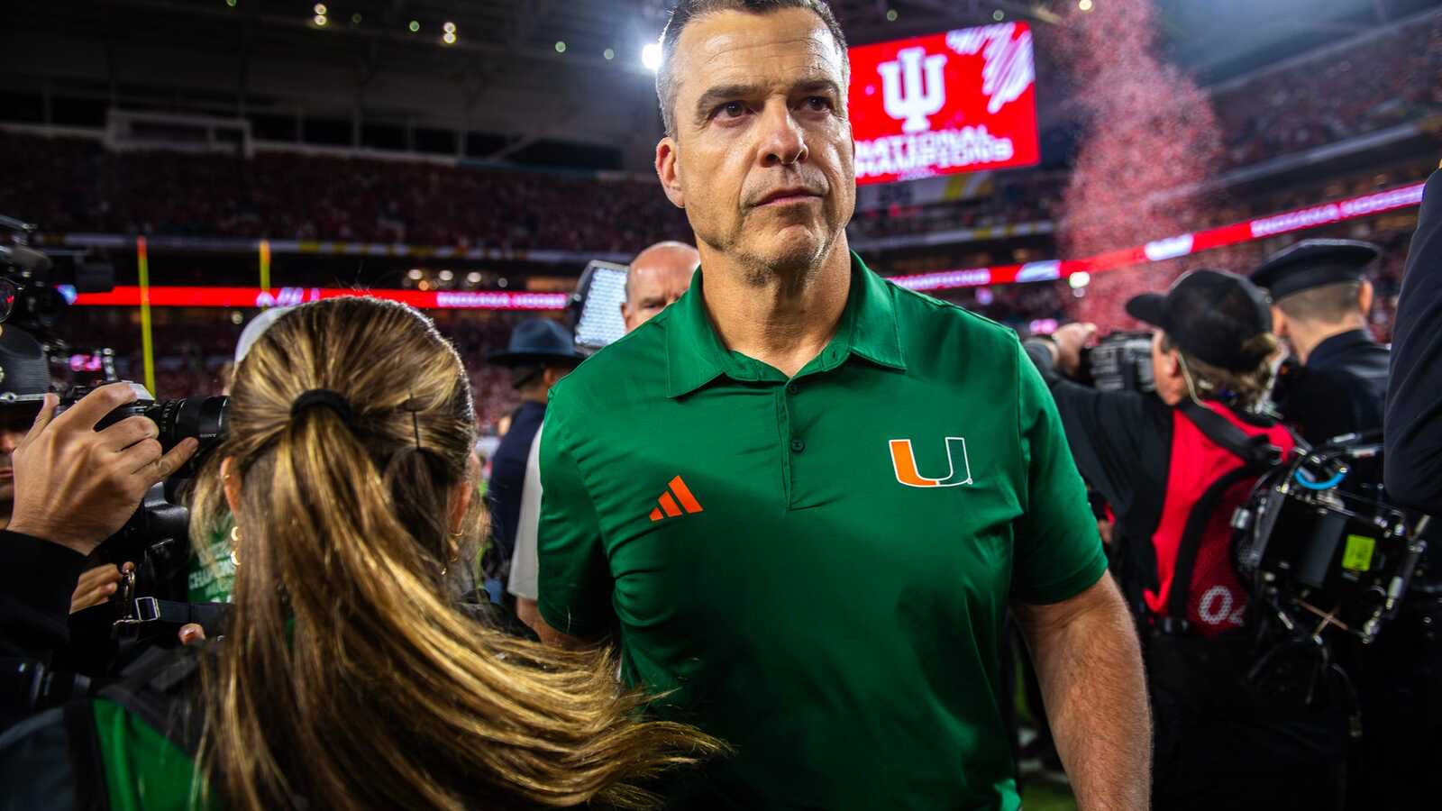 https://www.yardbarker.com/media/7/4/740548649b4b769094314869e224af3348fcf471/thumb_16x9/miami-head-coach-mario-cristobal-heads-off-field.jpg?v=2