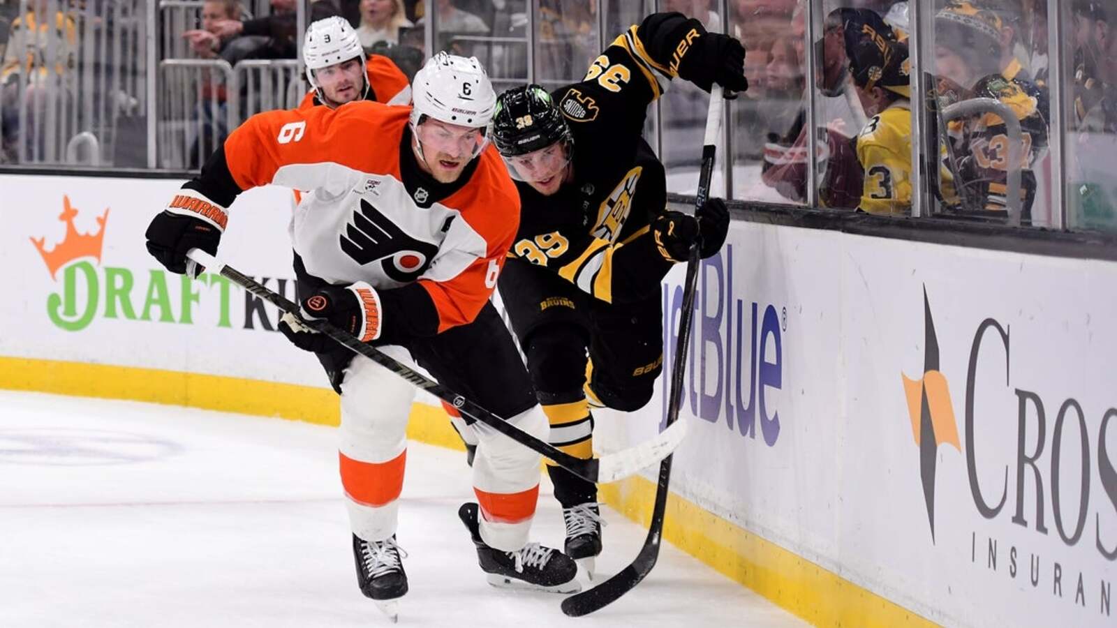 Bruins score 3 goals in final period, keep Flyers winless