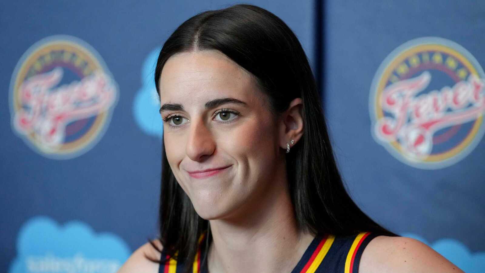 https://www.yardbarker.com/media/7/c/7c145dd2364970ea869e6e74992d98c8727ede35/thumb_16x9/indiana-fever-guard-caitlin-clark-speaks-during.jpg?v=1