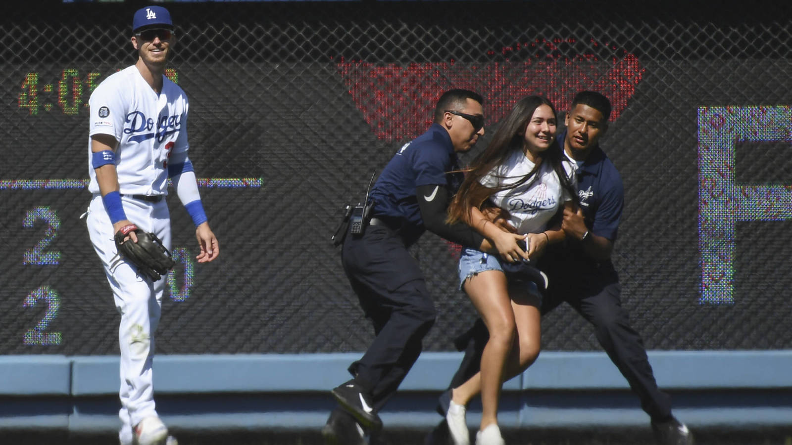 Fan sneaks on field to hug Cody Bellinger for second game in a row