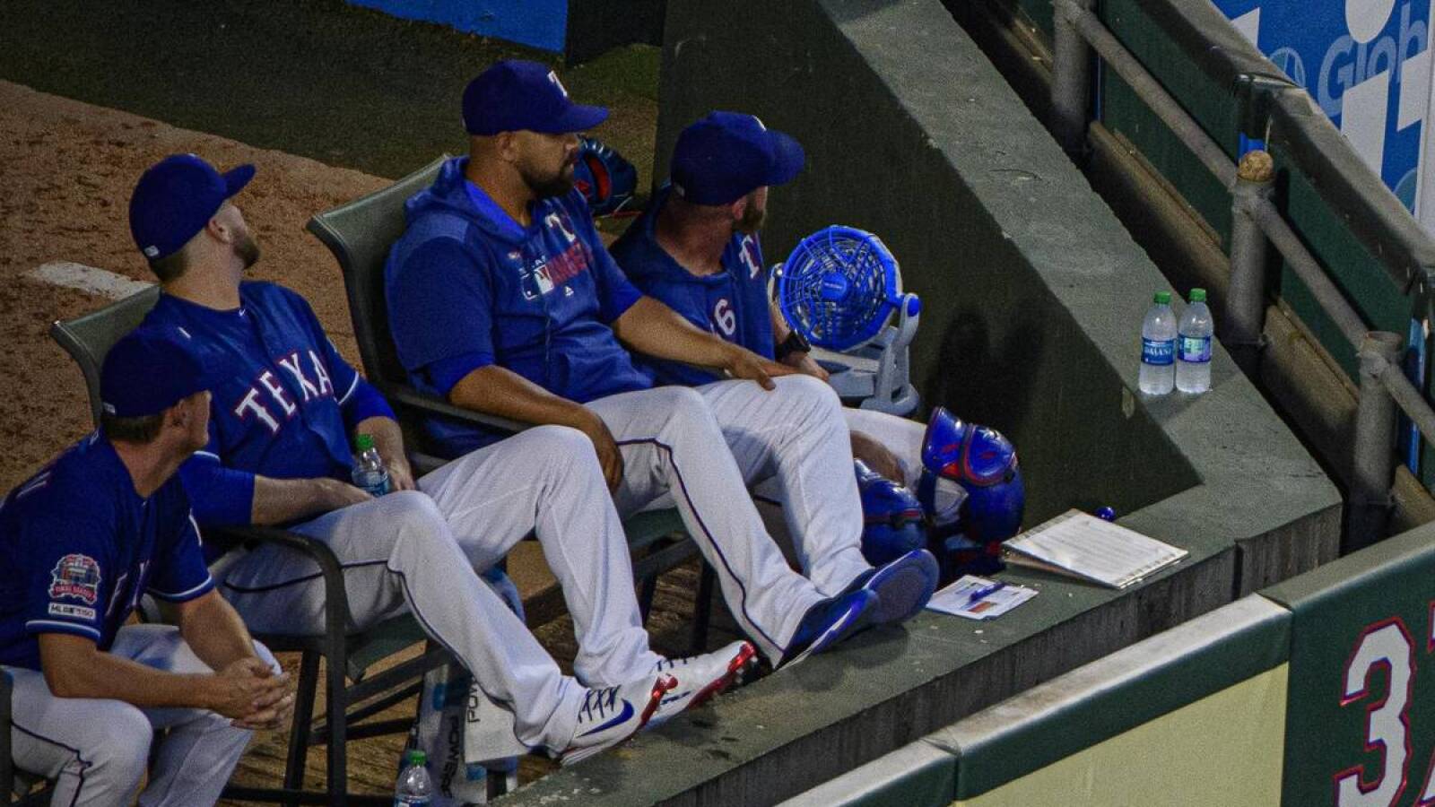 Watch Rangers Relievers Caught Trying To Watch Game From Coors Field