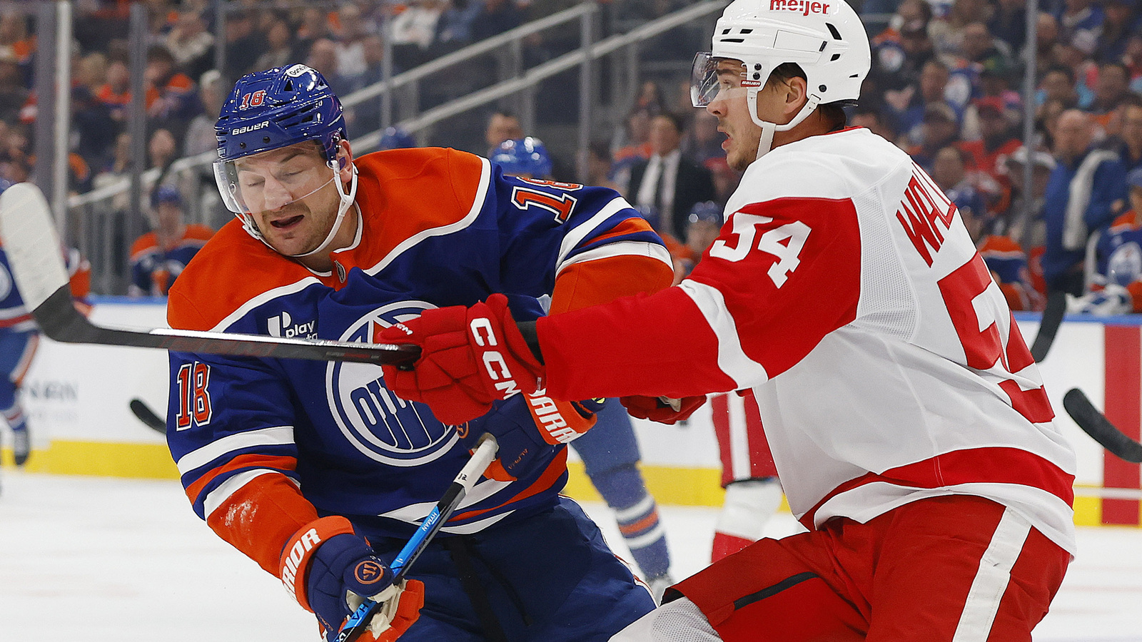 Oilers lose Hyman to injury, fall to Red Wings in shootout